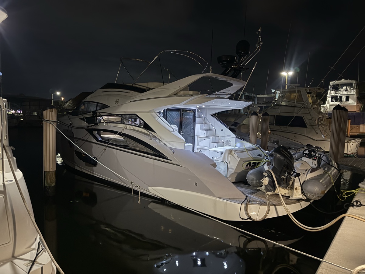 Yacht illuminated at night