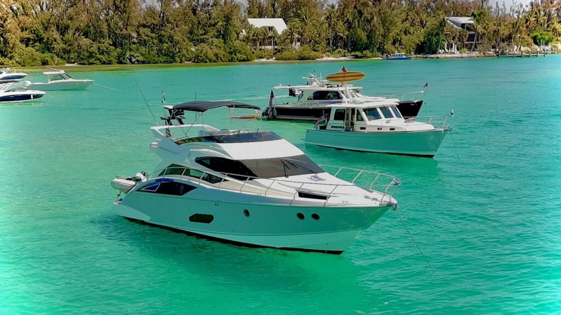 Private 52ft yacht cruising turquoise Gulf water near St. Petersburg